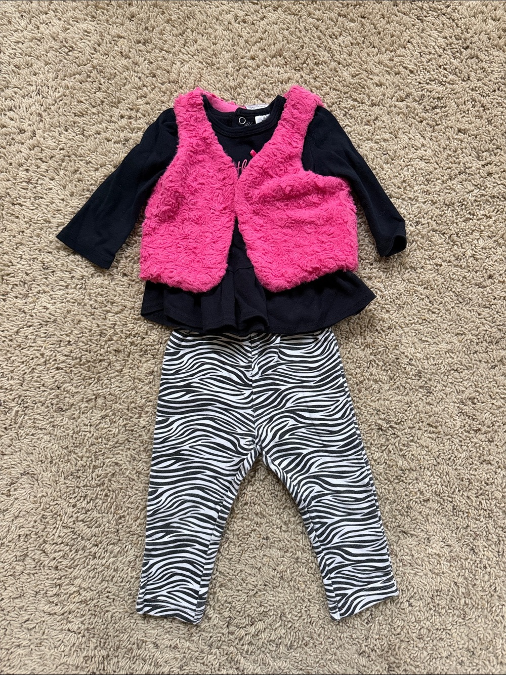Baby Essentials Hot Pink Faux Fur Vest with zebra leggings and black top